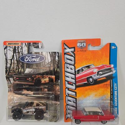 LOT 85: Multiple Matchbox Cars Including Truck Camper and More