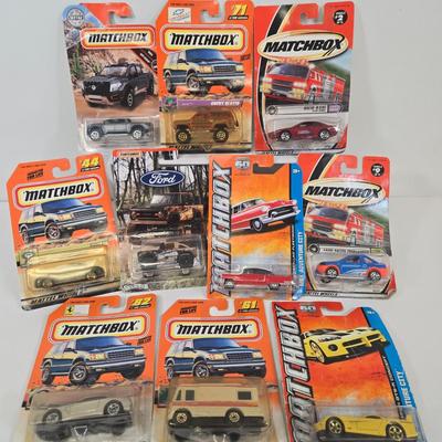 LOT 85: Multiple Matchbox Cars Including Truck Camper and More