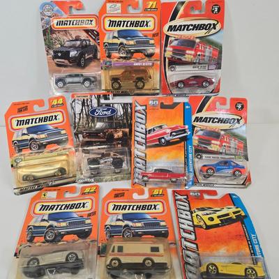 LOT 85: Multiple Matchbox Cars Including Truck Camper and More