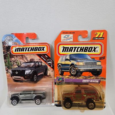 LOT 85: Multiple Matchbox Cars Including Truck Camper and More