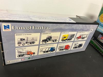 LOT 121: Collection of Toy Trucks with Original Packaging - Mobil, Sunoco and More