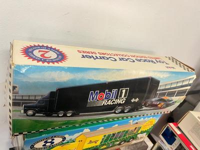 LOT 121: Collection of Toy Trucks with Original Packaging - Mobil, Sunoco and More