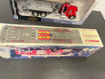 LOT 121: Collection of Toy Trucks with Original Packaging - Mobil, Sunoco and More