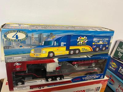LOT 122: Collection of Toy Trucks with Original Packaging - Amoco, Exxon and More