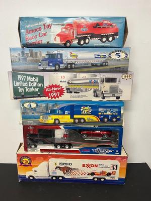 LOT 122: Collection of Toy Trucks with Original Packaging - Amoco, Exxon and More