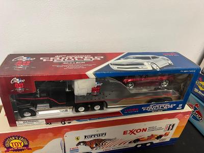 LOT 122: Collection of Toy Trucks with Original Packaging - Amoco, Exxon and More