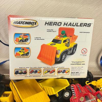 LOT 124: Bin of Construction Vehicle Toys - Tonka and More