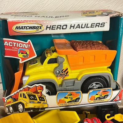 LOT 124: Bin of Construction Vehicle Toys - Tonka and More