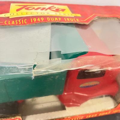 LOT 125: Various Vehicle Toys in Original Packaging - John Deere, Tonka and More