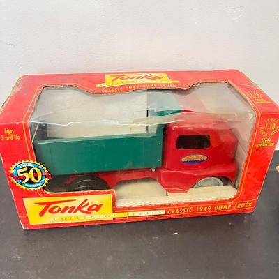 LOT 125: Various Vehicle Toys in Original Packaging - John Deere, Tonka and More