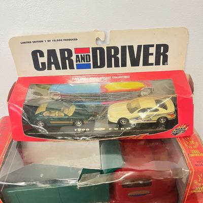 LOT 125: Various Vehicle Toys in Original Packaging - John Deere, Tonka and More