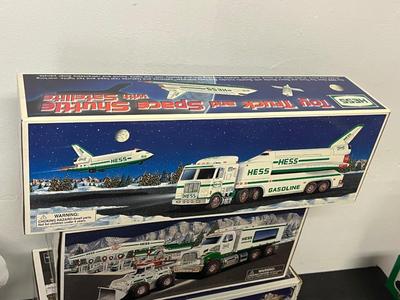 LOT 126: Collection of Hess Trucks with Original Boxes