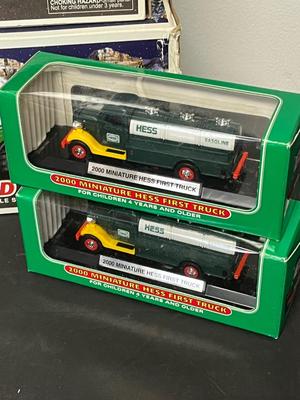 LOT 126: Collection of Hess Trucks with Original Boxes