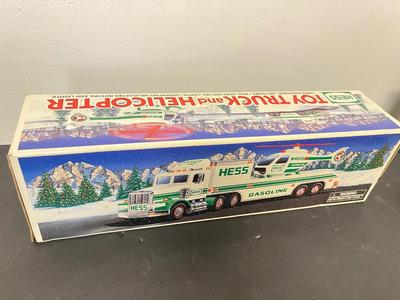 LOT 127: Collection of Hess Trucks with Original Boxes