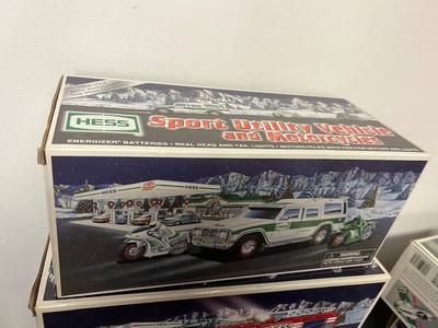 LOT 128: Collection of Hess Trucks with Original Boxes