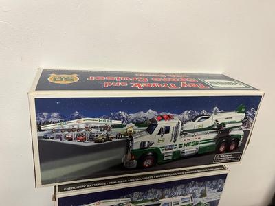 LOT 128: Collection of Hess Trucks with Original Boxes