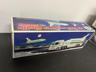 LOT 128: Collection of Hess Trucks with Original Boxes
