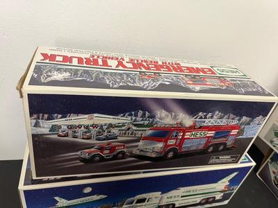 LOT 128: Collection of Hess Trucks with Original Boxes