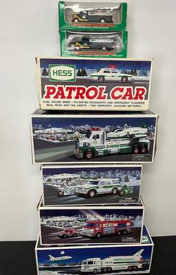 LOT 128: Collection of Hess Trucks with Original Boxes