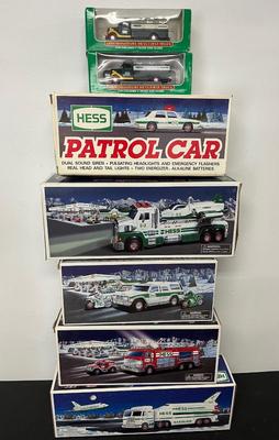 LOT 128: Collection of Hess Trucks with Original Boxes