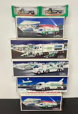 LOT 129: Collection of Hess Trucks with Original Boxes