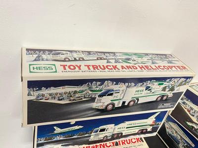 LOT 129: Collection of Hess Trucks with Original Boxes