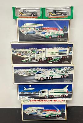 LOT 129: Collection of Hess Trucks with Original Boxes