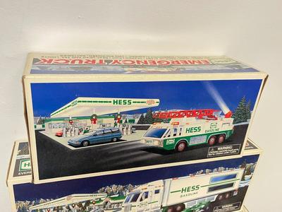 LOT 129: Collection of Hess Trucks with Original Boxes