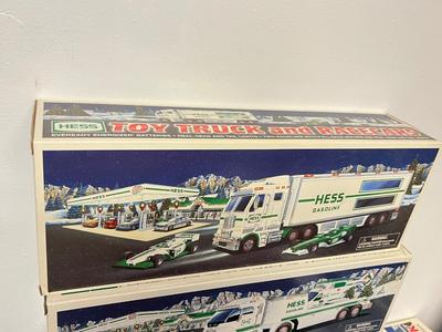 LOT 129: Collection of Hess Trucks with Original Boxes