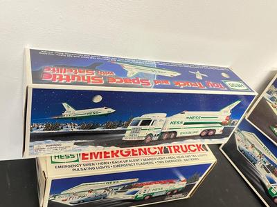 LOT 129: Collection of Hess Trucks with Original Boxes