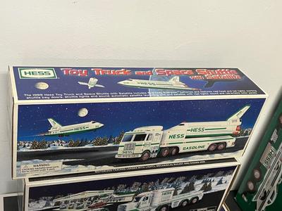 LOT 130: Collection of Hess Trucks with Original Boxes