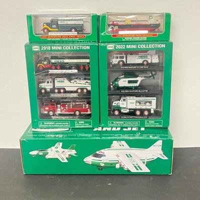 LOT 131: Collection of Hess Trucks with Original Boxes