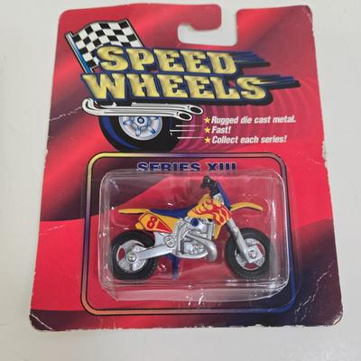 LOT 162: Multiple Motorcycles Including HotWheels, Road Champs, and More