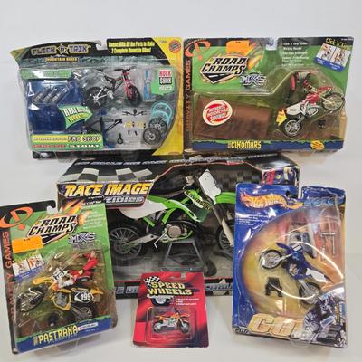 LOT 162: Multiple Motorcycles Including HotWheels, Road Champs, and More
