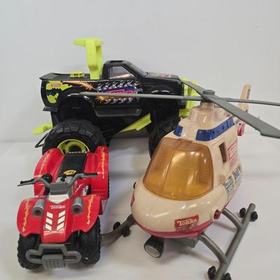 LOT 163: Tonka Monster Truck with Pull Start, Helicopter, and Four Wheeler