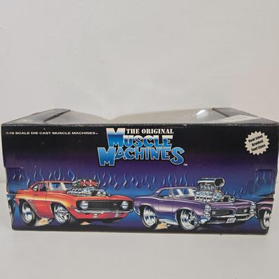 LOT 164: Muscle Machines '70 Cuda, '66 Mustang, and More