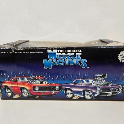 LOT 164: Muscle Machines '70 Cuda, '66 Mustang, and More