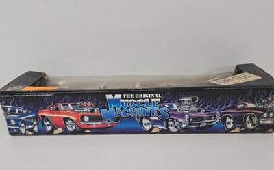 LOT 164: Muscle Machines '70 Cuda, '66 Mustang, and More