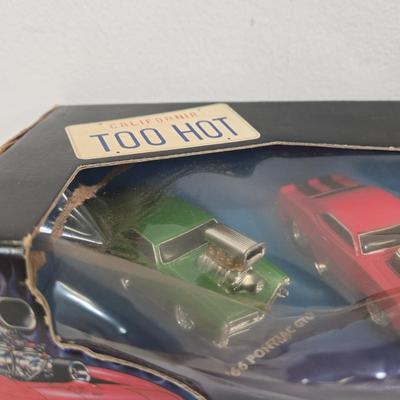 LOT 164: Muscle Machines '70 Cuda, '66 Mustang, and More