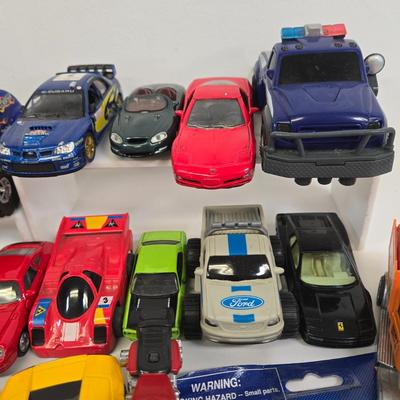 LOT 172: Race Cars, Police Vehicles, and More