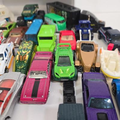 LOT 178: HotWheels Crane Trucks, Rock on Wheels Truck, and More