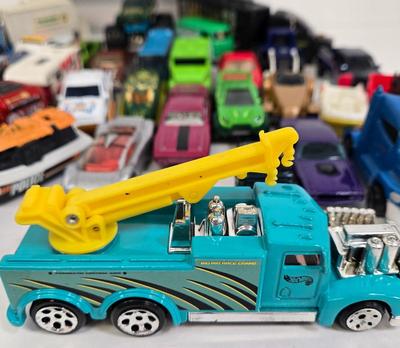 LOT 178: HotWheels Crane Trucks, Rock on Wheels Truck, and More
