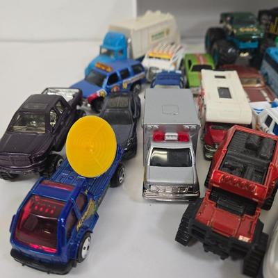 LOT 178: HotWheels Crane Trucks, Rock on Wheels Truck, and More