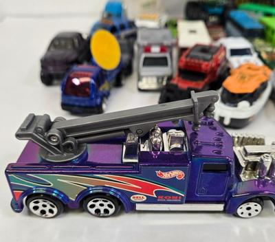 LOT 178: HotWheels Crane Trucks, Rock on Wheels Truck, and More