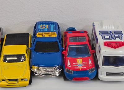 LOT 178: HotWheels Crane Trucks, Rock on Wheels Truck, and More
