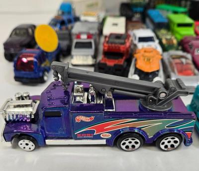 LOT 178: HotWheels Crane Trucks, Rock on Wheels Truck, and More