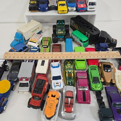 LOT 178: HotWheels Crane Trucks, Rock on Wheels Truck, and More