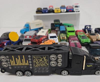 LOT 178: HotWheels Crane Trucks, Rock on Wheels Truck, and More