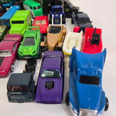 LOT 178: HotWheels Crane Trucks, Rock on Wheels Truck, and More