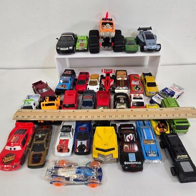 LOT 179: Race Cars, Lightning McQueen, Wrestling Cars, and More